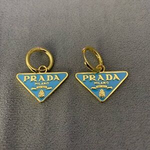 Elegant Gold and Blue Logo Earrings